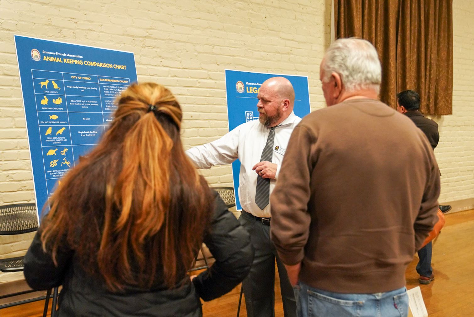 Annexation Open House Staff Speaking to Participants
