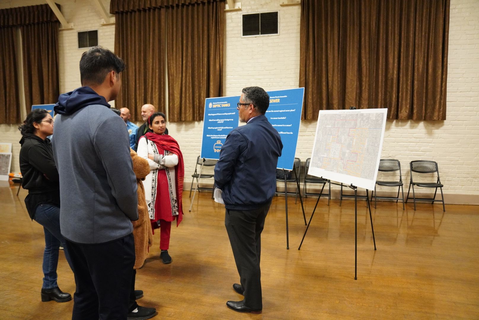 Annexation Open House Staff Speaking To Participant6