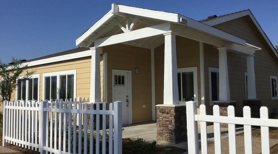 Yellow House White Picket Fence